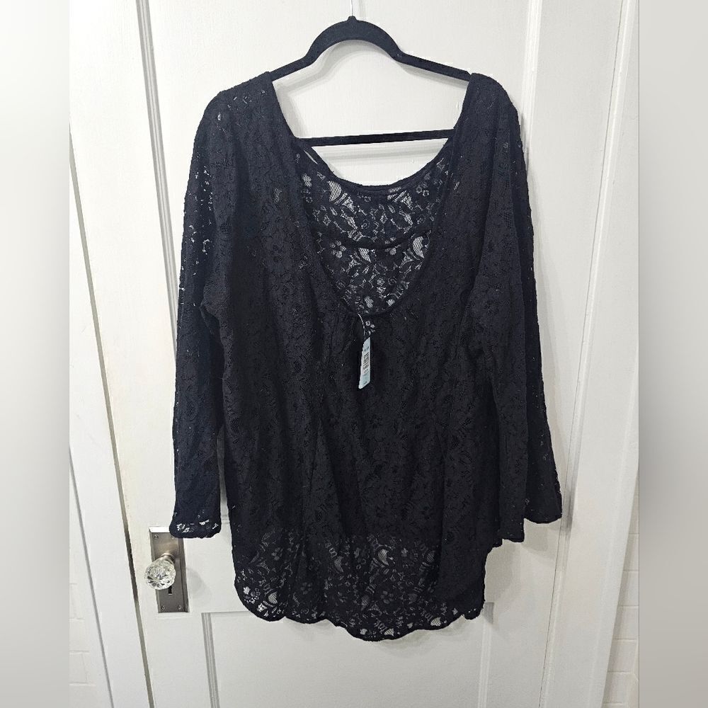 Torrid black lace top. High low in back with scoop back. Sz 2
